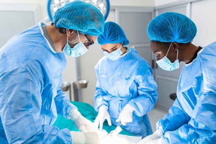 1932544256 Surgeons performing an operation in a sterile environment
