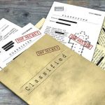 Epstein Transparency Fight Fallout Classified documents with Top Secret stamps on wooden surface.
