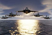 Rival Powers Eye South America – F-16s Shift Balance Five jets flying low over the ocean at sunset.