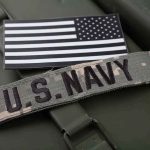 SEAL Fiction EXPOSED — Fake Military History U.S. Navy patch with black-and-white American flag.
