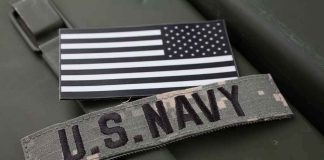 U.S. Navy patch with black-and-white American flag.