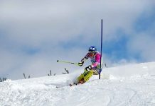 Oldest Skier EVER Wins World Cup! Athlete skiing down a snowy slope around a slalom pole
