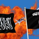 Two black flags with Arabic writing, flames background.