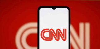 CNN logo on a phone screen.