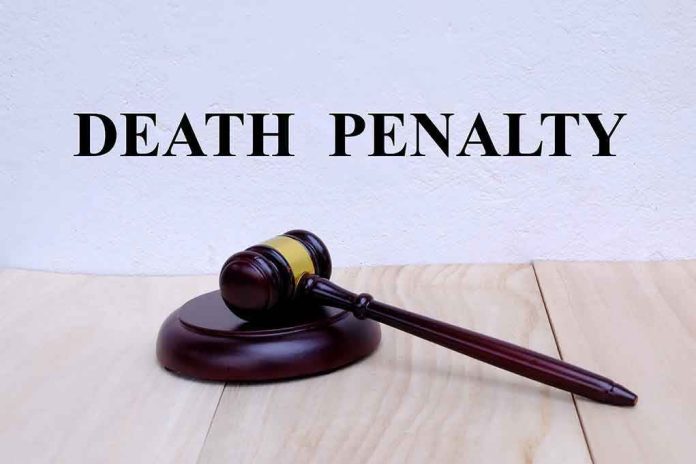 Gavel under Death Penalty text on white background.