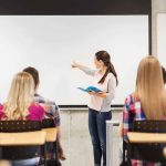 Shocking Cosmic Revelation: Did Science Just Prove God? A teacher presenting to students in a classroom