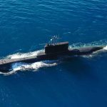 Submarine sailing on the ocean surface