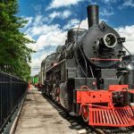 Nude Daredevil Halts Union Pacific Steam locomotive on display at a railway museum