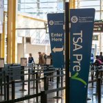 TSA PreCheck sign at airport security