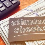 stimulus checks note on cash with calculator