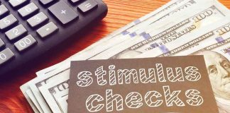 stimulus checks note on cash with calculator
