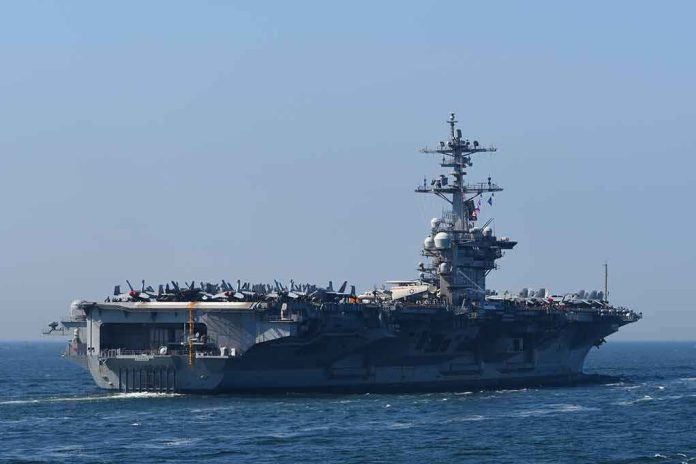 shutterstock_2153816283 Aircraft carrier cruising at sea