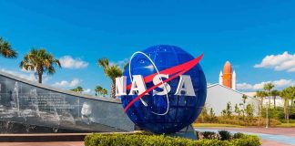 NASA globe sign at visitor complex entrance