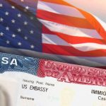 Trump Team Yanks Ambassador’s Papers US visa document with American flag in background