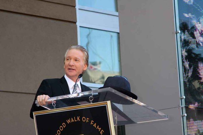 A man in formal attire speaking at a podium during a Hollywood Walk of Fame ceremony