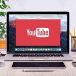Democrats To Use ‘Thirst Trapping’ Tactics for 2026 Midterms YouTube logo on a laptop screen on desk.