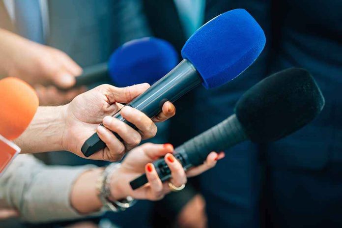 default-hero-01-2 Reporters holding colorful microphones