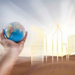 White House Pushes Major U.S. Energy Expansion Hand holding a small globe in front of a glowing city skyline outline