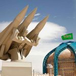 8 Marines Injured In Iranian Missile Attack missile launcher beside domed building with green flag