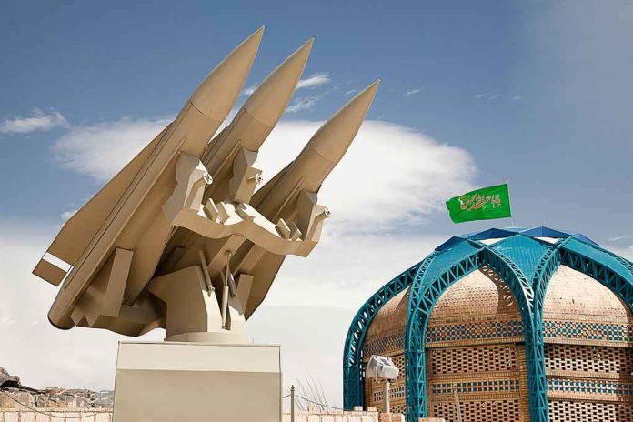 missile launcher beside domed building with green flag