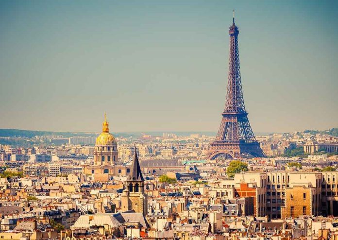 shutterstock_111362132 A panoramic view of Paris featuring the Eiffel Tower and a golden dome