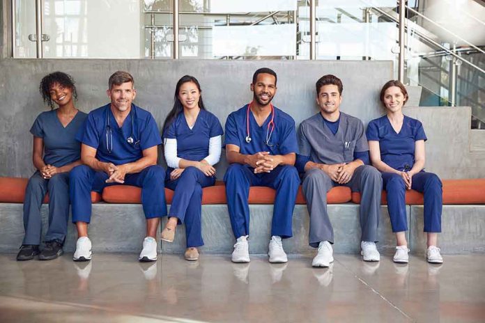 Group of medical professionals sitting on a bench