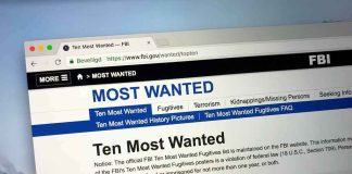 Computer screen showing an FBI Most Wanted webpage
