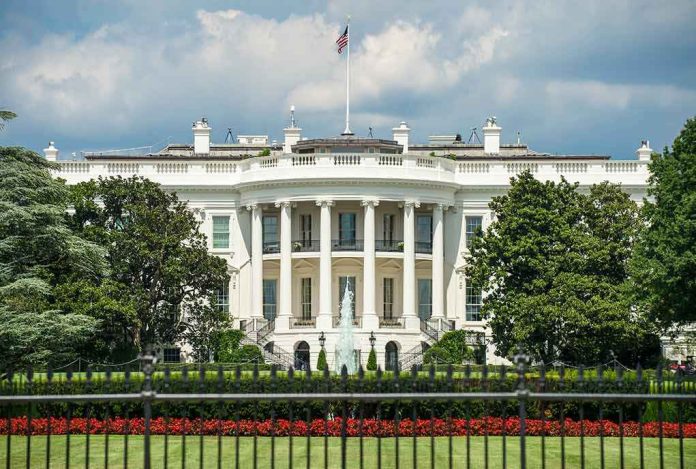 The White House north facade behind a black iron fence