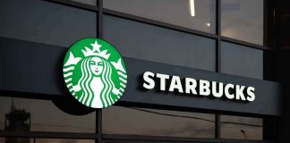 Starbucks store exterior with illuminated sign