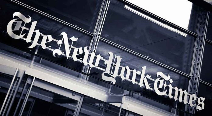 shutterstock_1239948853 The New York Times sign on a glass building facade