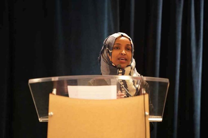 shutterstock_1397740553 Woman in hijab speaking at a podium