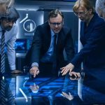 Anthropic’s AI Watchdog Choice Comes Under FIRE Business team reviews data on a large interactive table