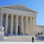 Court Fines Assault Survivor Over TV Remark Supreme Court building with grand columns and steps