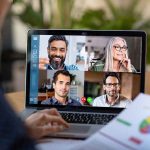 Phone Interviews: Career Suicide—Or Bias Trap? Laptop screen showing a four-person video conference call
