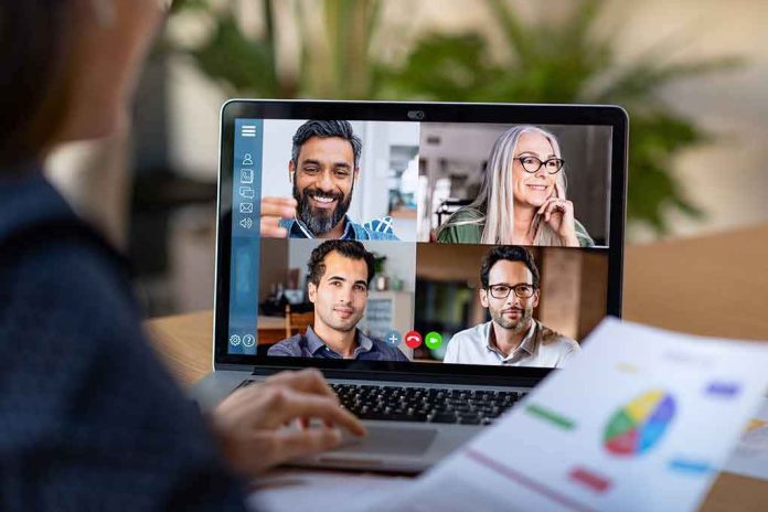 shutterstock_1676998309 Laptop screen showing a four-person video conference call