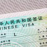 Visa Crackdown Muzzles Campus And Press Chinese visa document close-up