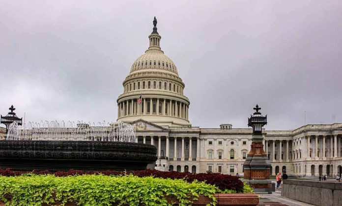 United States Capitol building with dome and fountain in foreground