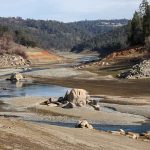 Drought Turns Rivers Into Fish Traps Drought-exposed riverbed with scattered boulders and low water
