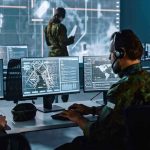 BIG Brother: ICE Spent $525 Million on Surveillance Tech Military analysts at computers in a command center