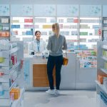 Drug Price Bombshell Rocks Medicaid Yvonne Li assisting a customer at a pharmacy counter