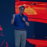 Colbert’s Shocking Exit: Truth Behind the Cancellation Stephen Colbert speaking on stage with a microphone