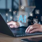 Washington SPLITS Over AI Safety Push Hands typing on laptop with AI and tech icons overlay