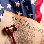 Judge SLAMS Brakes On Explosive Trump Report U.S. Constitution with gavel on American flag
