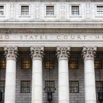 Judge FREEZES $1.8B DOJ Slush? United States courthouse facade with Corinthian columns