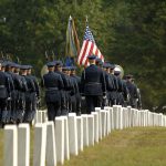 George Floyd Tribute Backfires on Memorial Day Military honor guard marches through a cemetery with flags