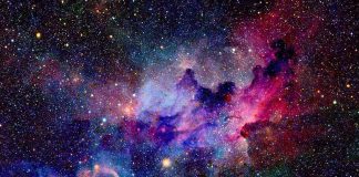 Colorful nebula with bright stars