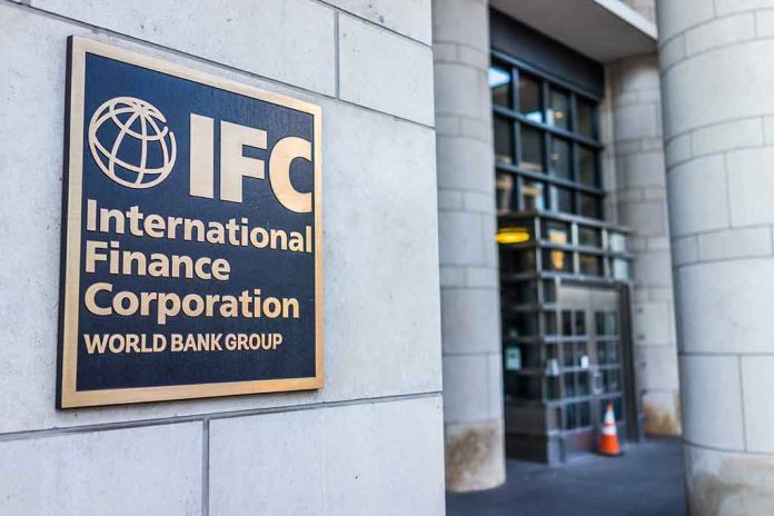 IFC plaque on building exterior near glass entrance