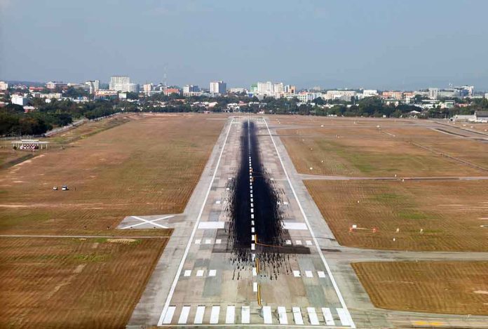 Runway with heavy tire marks at an airport