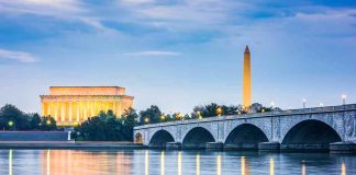 Arlington Memorial Bridge with Lincoln Memorial and Washington Monument at dusk
