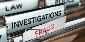 File folders labeled investigations and fraud in a filing cabinet